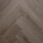 Angled view of herringbone wood planks