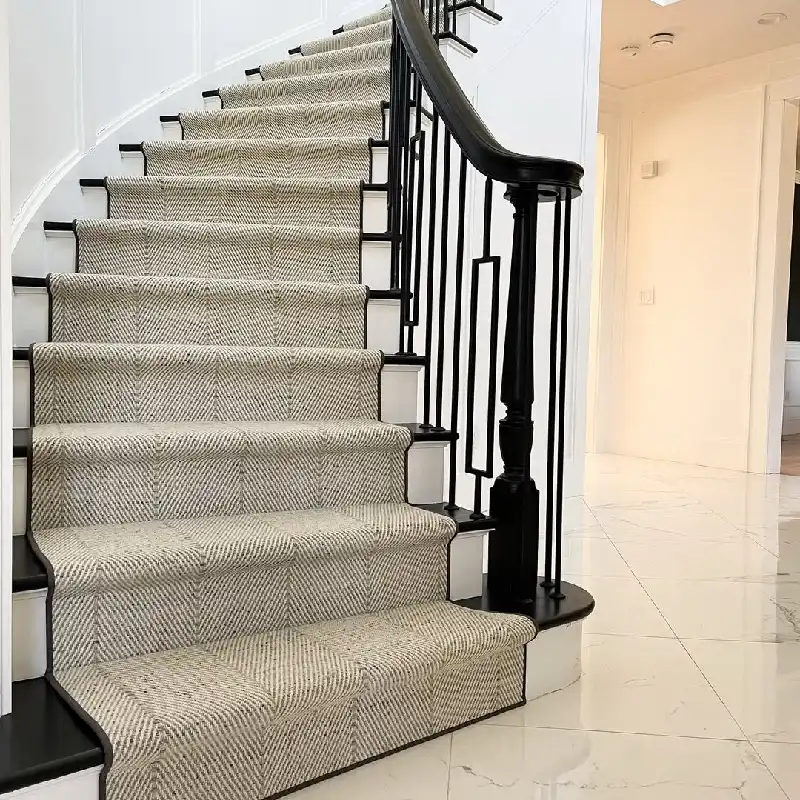 Beige herringbone stair runner with dark wood trim