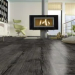 Bright bedroom with natural oak wood flooring.