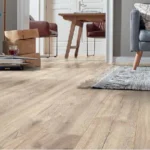 Bright living room with rustic oak flooring.