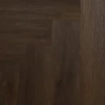 Close-up of dark brown herringbone wood planks