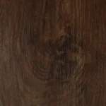 Close-up of dark wood grain with natural knot