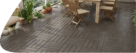 Dark brown interlocking WPC deck tiles on a patio