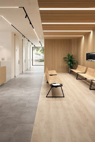 Dual-tone vinyl flooring in a modern office lobby.