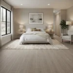 Light gray wood-look LVT plank flooring in a modern bedroom