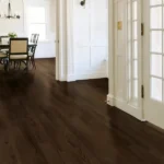 Modern room with dark wood floors and white walls