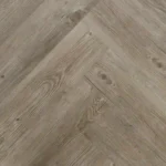 Overhead view of light oak herringbone floor pattern