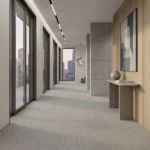 wool carpet in a modern hallway with floor-to-ceiling windows and a console table.