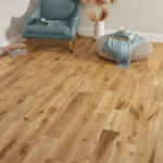 A styled room featuring natural oak wood flooring.