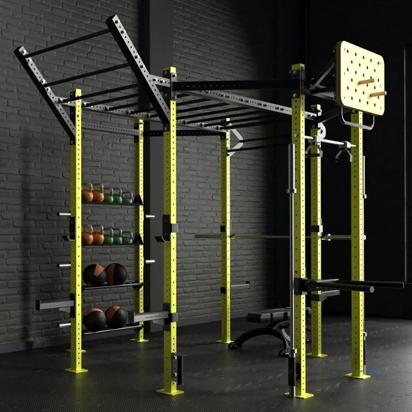 Black rubber gym flooring under yellow workout rig