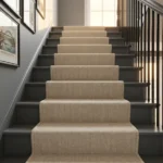 Beige herringbone stair runner looking down