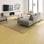 Bright living room decorated with vertical light bamboo flooring.