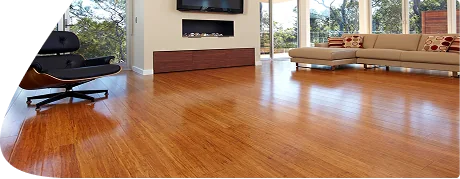 Bright polished solid wood flooring in a spacious modern living room.