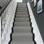 Chevron stair runner with black border looking down