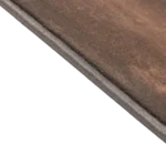 Close-up of brown carpet texture with a stitched edge.