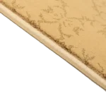 Close-up showing the beige mosque carpet texture