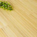 Close-up texture of vertical light bamboo flooring with orchid.
