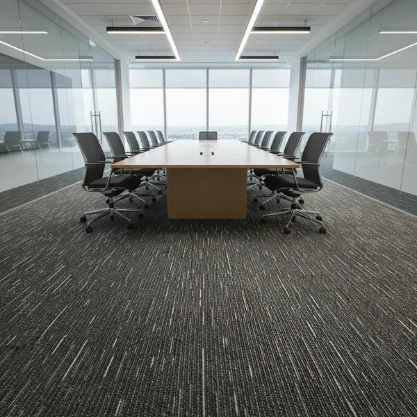 Linear dark grey speckled carpet tiles in a board conference room