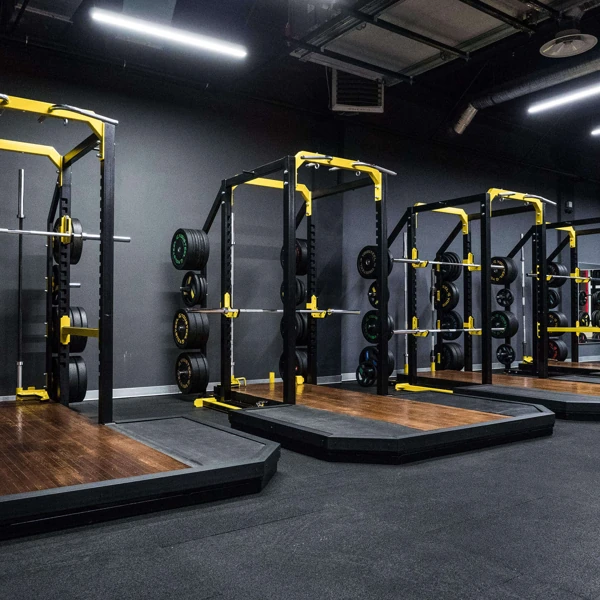 Commercial gym flooring with heavy duty power racks