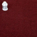 Dark red carpet with a white star lantern