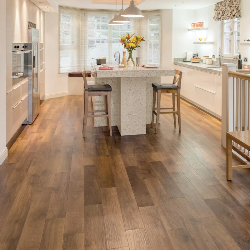 Dark semi solid wood floor in open kitchen