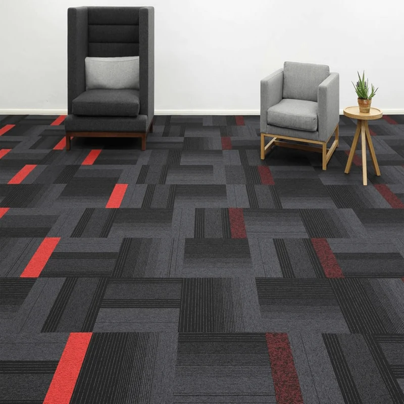 Geometric grey and charcoal carpet tiles in a lobby