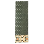 Green mosque carpet with diamond pattern and geometric border.