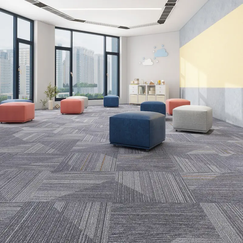 Herringbone pattern grey carpet tiles in an office