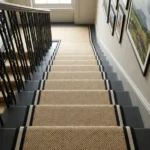 Herringbone stair runner on dark grey staircase