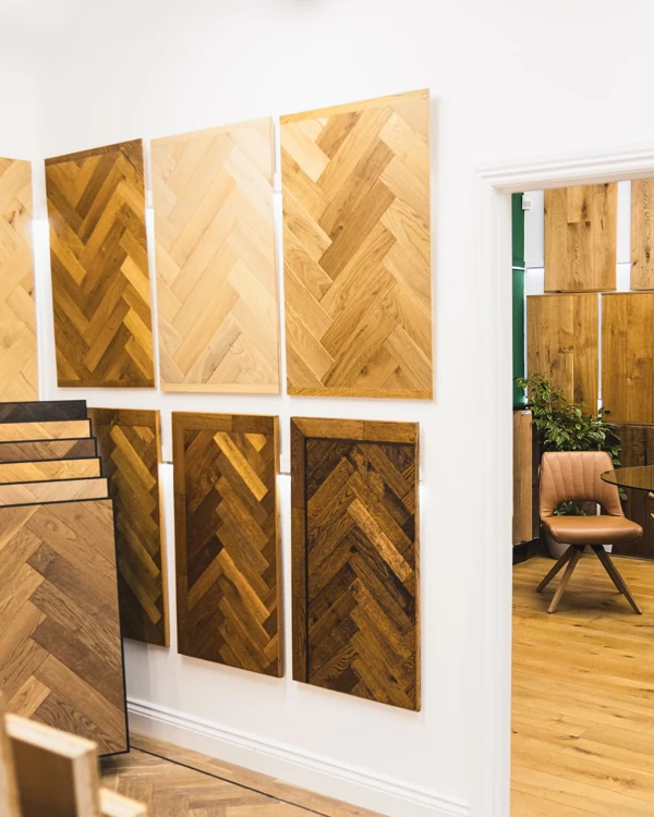 Interior view of a flooring showroom showcasing multiple shades