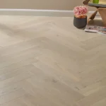 Light oak herringbone engineered wood flooring planks