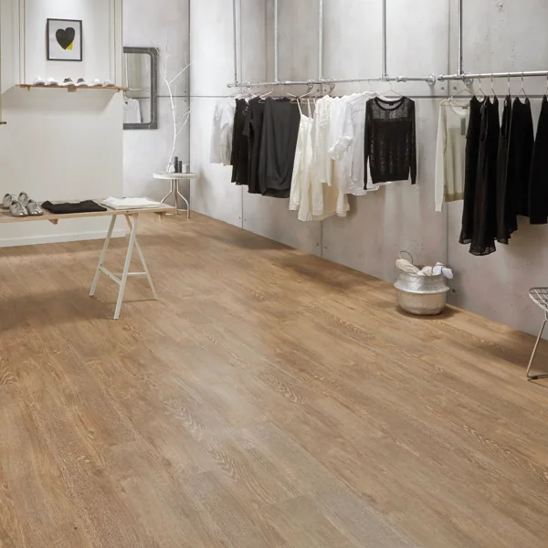 Modern boutique store with wood-look PVC flooring.