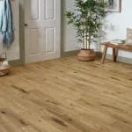 Natural oak floor in a bright, styled room.