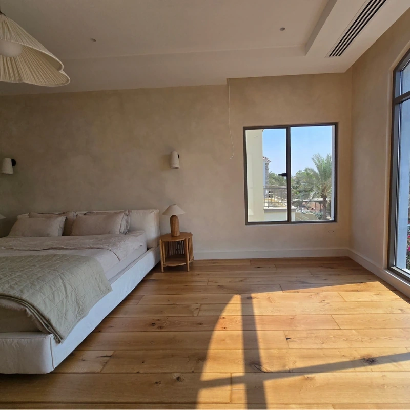 Natural oak semi solid flooring in bright bedroom