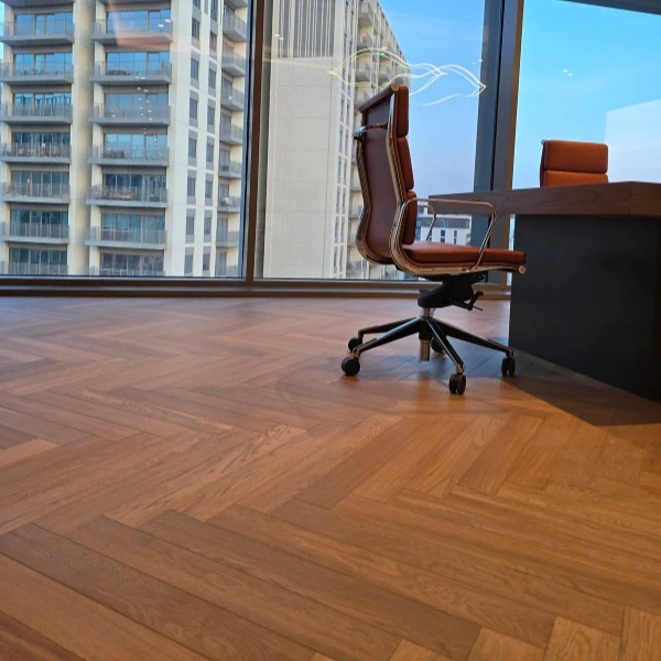 Natural semi solid flooring planks with distinct grain in Office