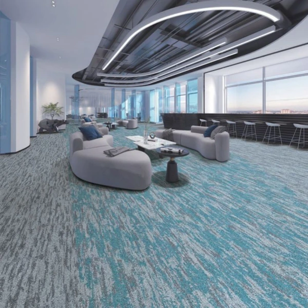Teal and gray patterned nylon carpet in a lounge.