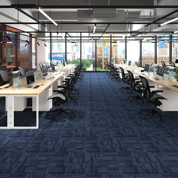 Deep blue striped modular carpet tiles in a large open office