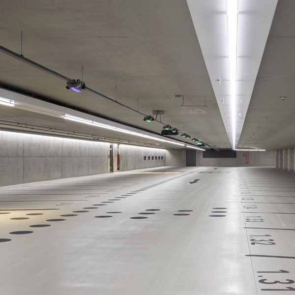 Clean concrete coating in an empty underground parking basement