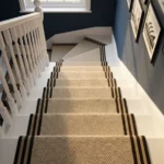 Patterned stair runner on grey painted steps