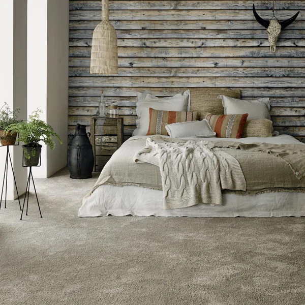 Rustic bedroom with beige plush carpet