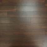 Top-down background view of dark espresso bamboo flooring planks