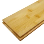 Two sample planks of horizontal natural bamboo flooring isolated
