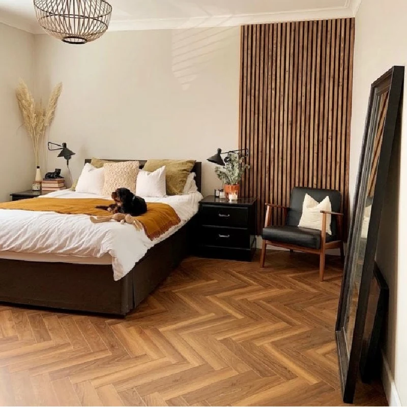 Warm caramel chevron bamboo parquet flooring.