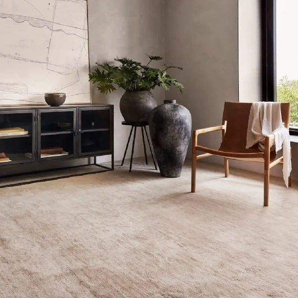Neutral wool carpet in an earthy, minimalist room