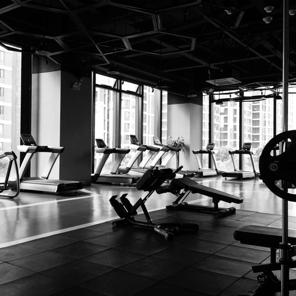 rubber gym flooring tiles installed in a modern fitness center