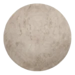 Beige round carpet with a soft, plush texture.