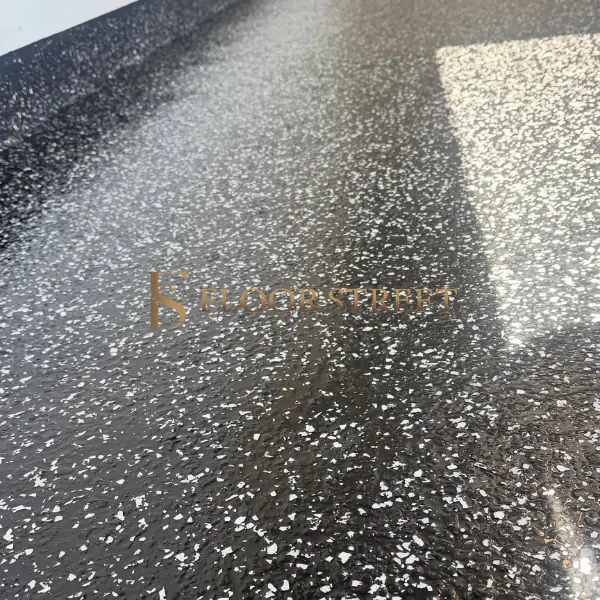 Black garage floor coating with a flake-filled design.