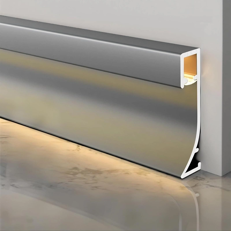 Brushed metal baseboard in a modern office hallway
