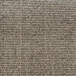 Close-up of beige and cream textured loop pile carpet