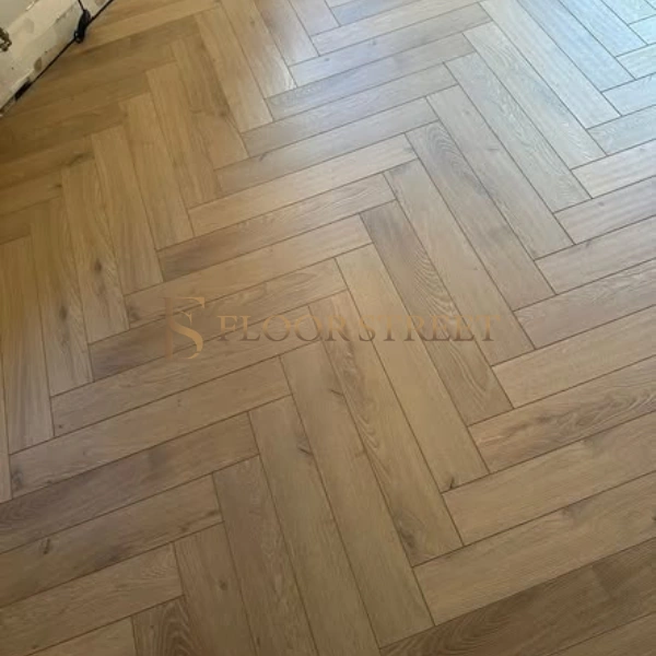 Close-up of herringbone LVT flooring